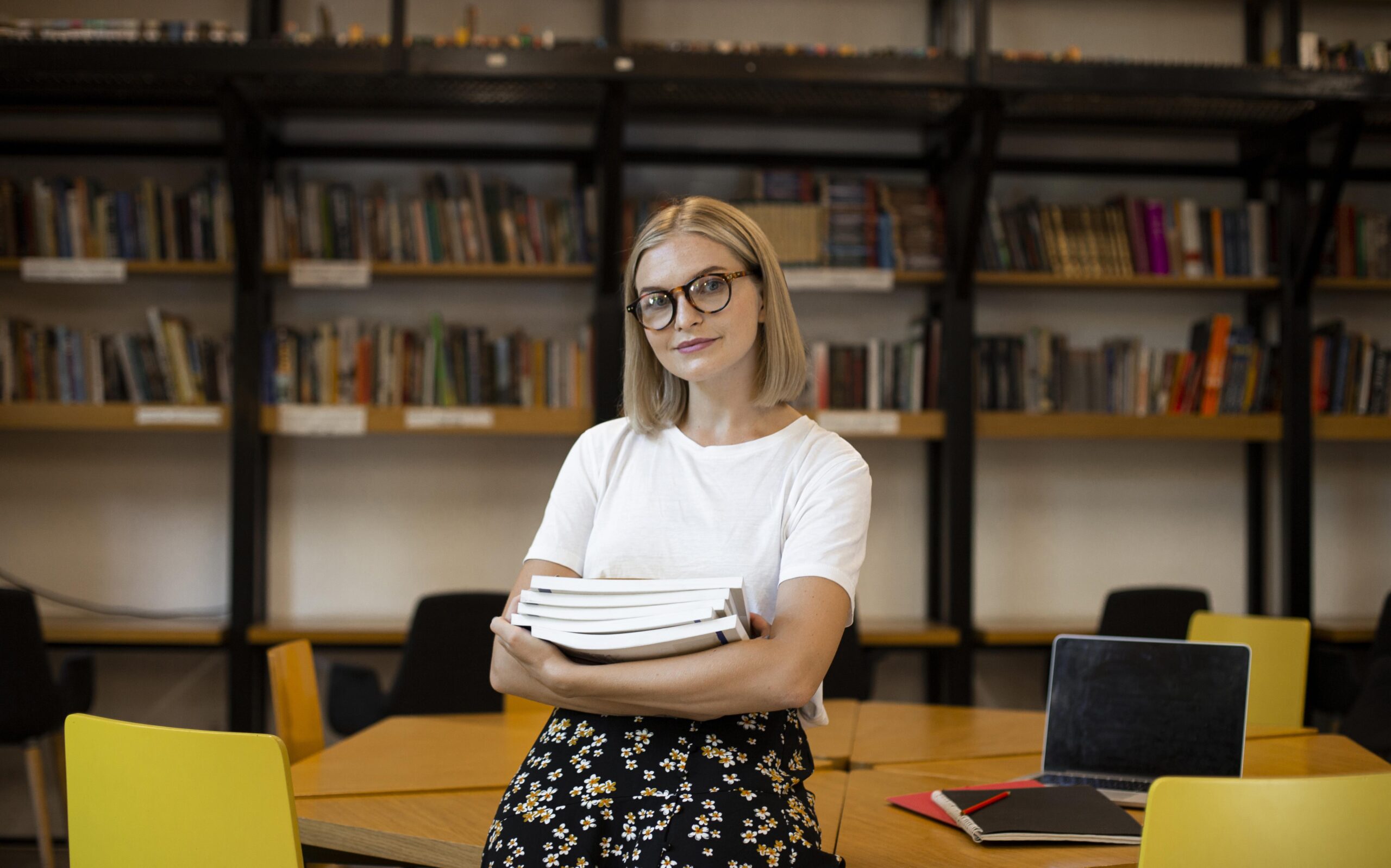 pretty-young-woman-posing-library